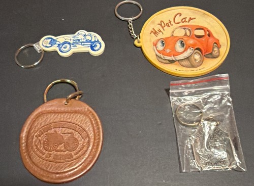 Lot four car keychains - lot,